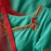 Sea Green Silk Anarkali Gown with Hand Embroidered Parrot Motif & Red Net Dupatta | Long Ethnic Party Wear Dress